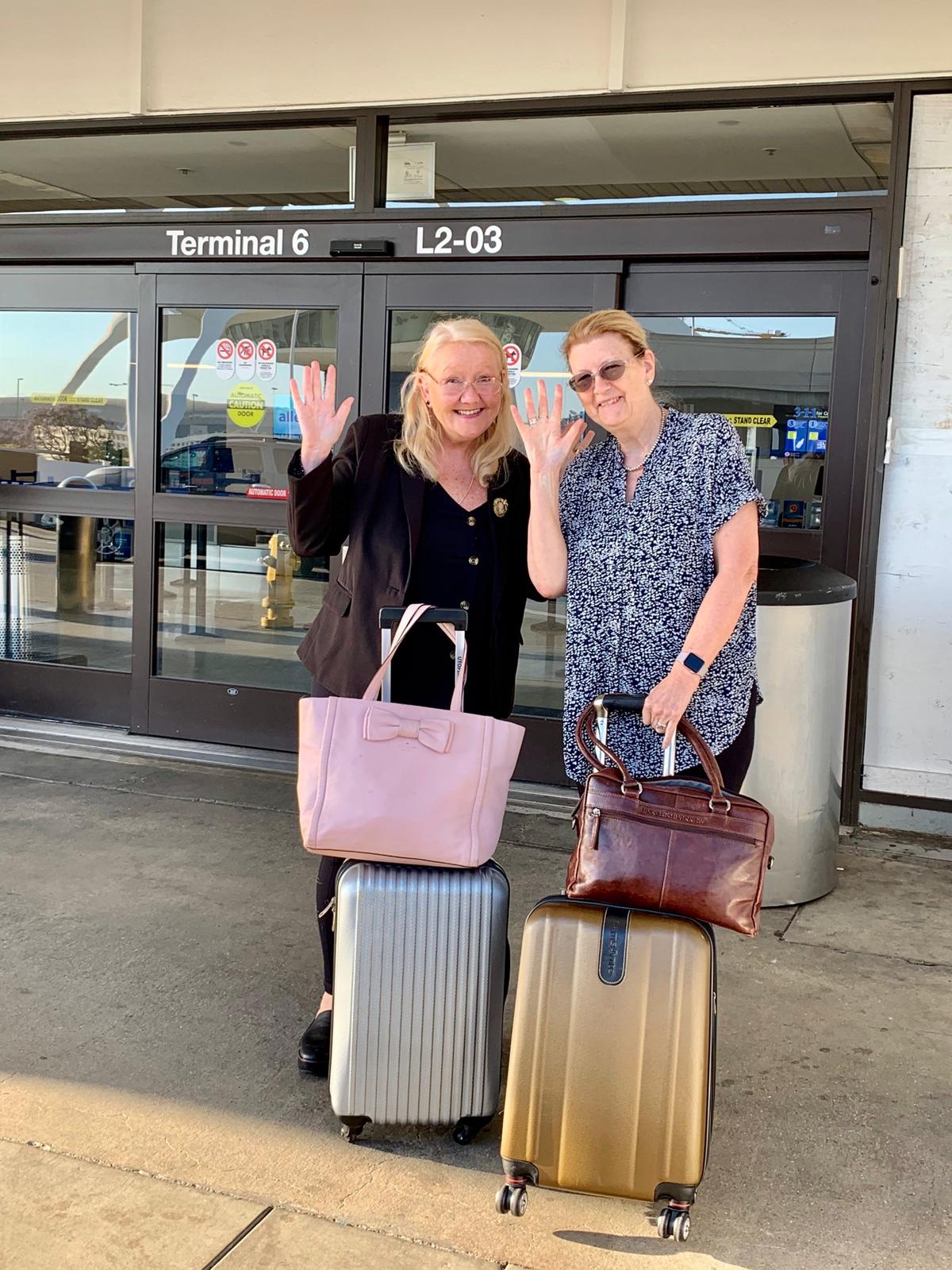 Maureen travelling with luggage